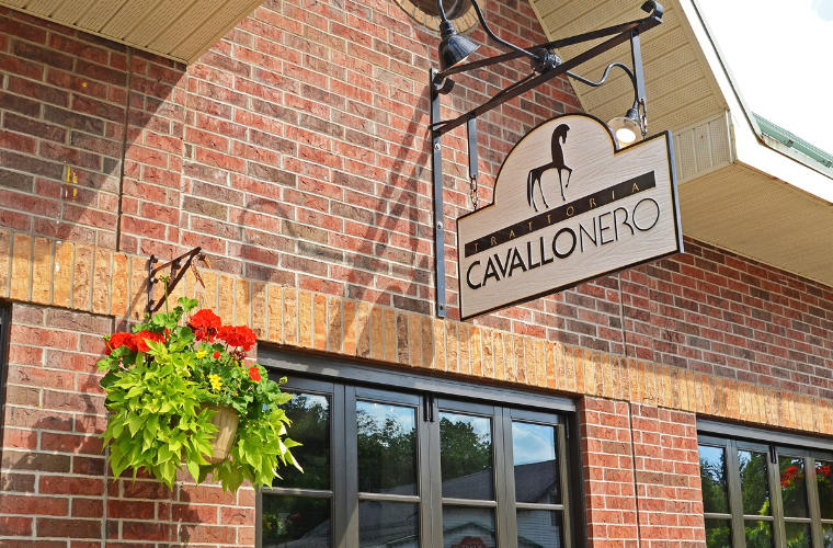 The sign for Cavallo Nero above its front entrance