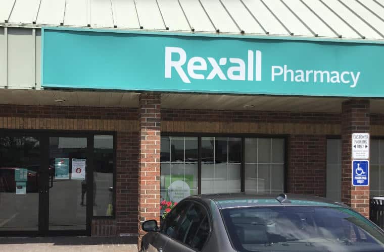 The sign above Rexall Pharmacy.